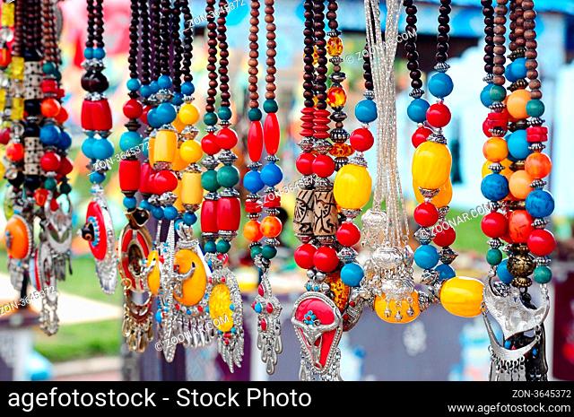Colorful Tibetan jewelry and personal ornaments at a market in Tibet