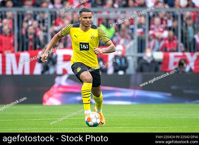 23 April 2022, Bavaria, Munich: Soccer: Bundesliga, Bayern Munich - Borussia Dortmund, Matchday 31, Allianz Arena. Manuel Akanji from Borussia Dortmund plays...