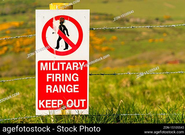 Sign: Military firing range keep out, seen on the South West Coast Path between Worbarrow Bay and Brandy Bay, Jurassic Coast, Dorset, UK