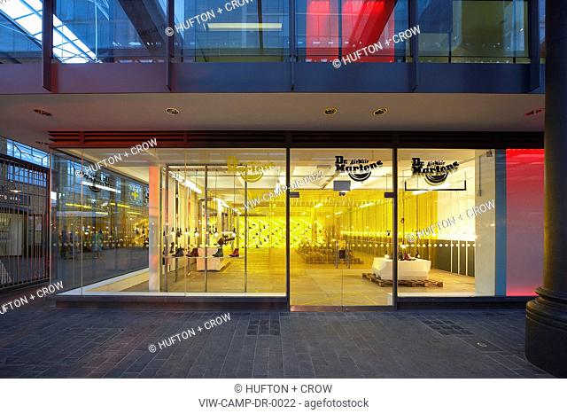 DR MARTEN POP-UP STORE, CAMPAIGN DESIGN, SPITALFIELDS, LONDON, UK, 2009. EXTERIOR VIEW OF THE SHOP FRONT SHOWING THE INTERIOR ILLUMINATED INSIDE