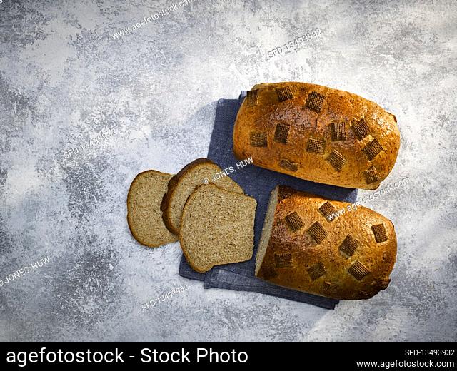 Boxed bread with wholemeal cornflakes, sliced