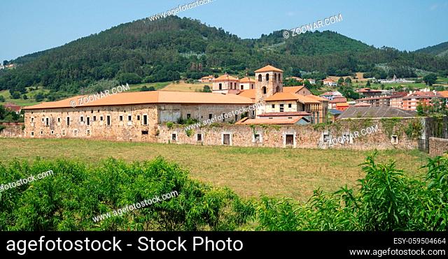 Panoramic view to the old monastery of Cornellana, landmark on the Camino de Santiago trail between Grado and Salas, Asturias, Spain