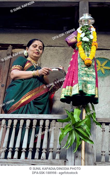 Woman celebrated Gudi Padva festival in house Pune Maharashtra India Asia MR#686CC