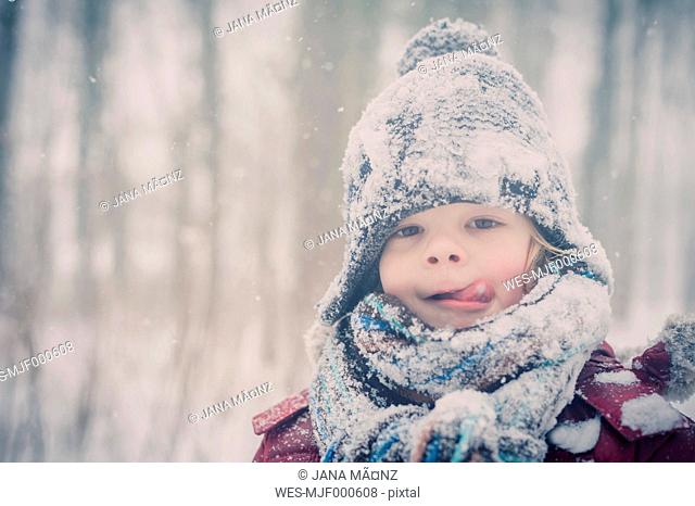 Boy in snow, portrait