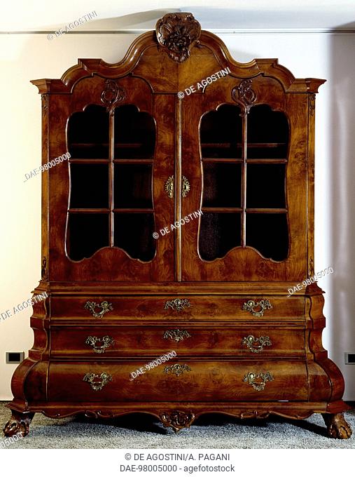 Walnut and walnut root secretary-bookcase with three bowed drawers, two glass doors, paw shaped feet and gilt bronze applications