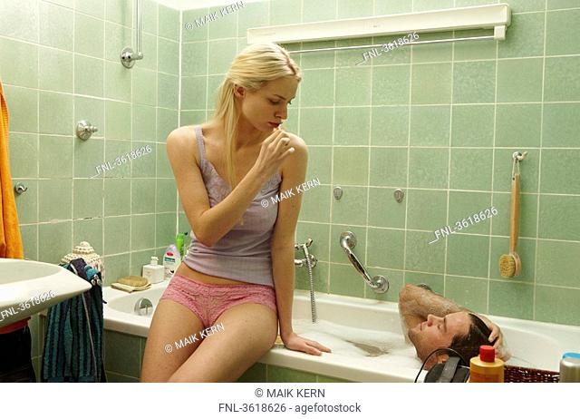Young couple in bathroom