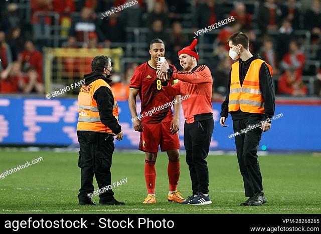 Belgium's Youri Tielemans takes a selfie with a Red Devils' supporter after a friendly soccer match between Belgian national team the Red Devils and Burkina...