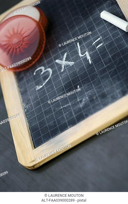 Chalkboard with simple math equation