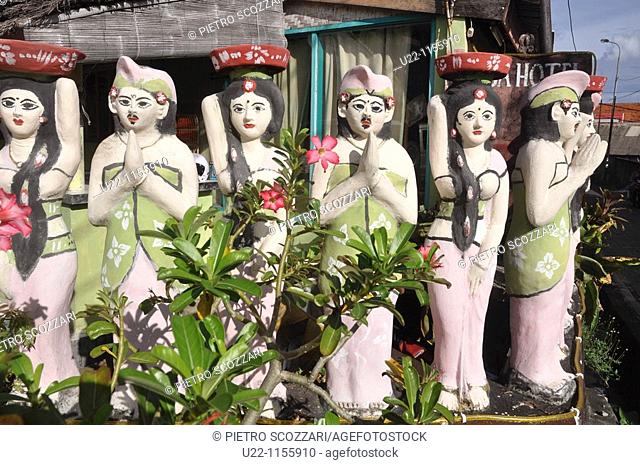 Legian (Bali, Indonesia): statuettes at the entrance of a guest-house