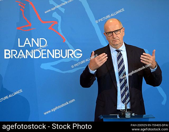 29 September 2020, Brandenburg, Potsdam: Dietmar Woidke (SPD), Minister President of Brandenburg, speaks during a press conference in the State Chancellery...
