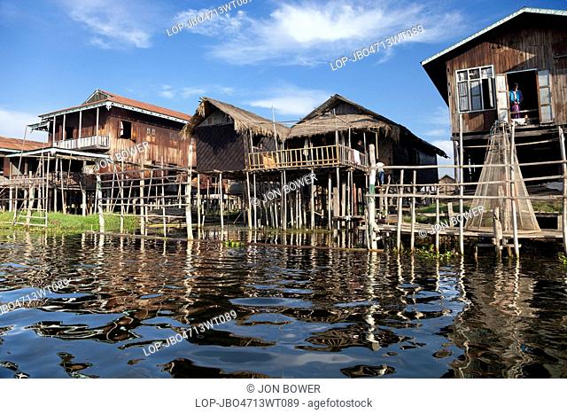 Myanmar, Shan, Lake Inle. A village with houses on stilts by Lake Inle in Myanmar
