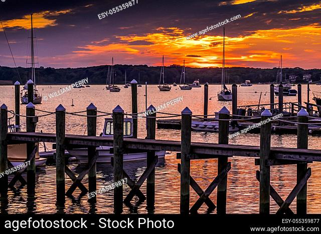 Sunset Pier Padanaram Inner Harbor Motorboats Sailboats Dartmouth Massachusetts. .