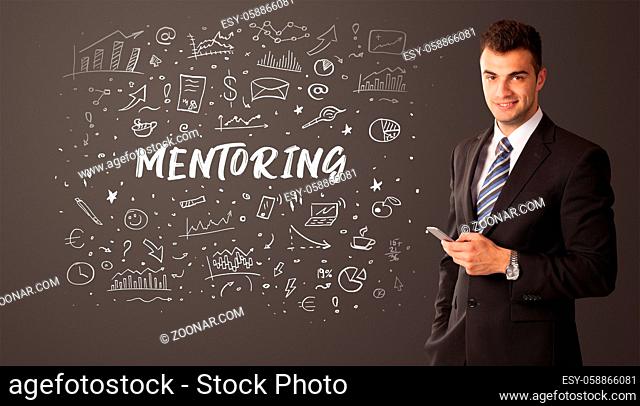 Businessman thinking with MENTORING inscription, business education concept