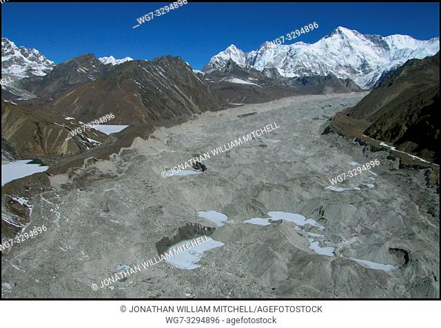 NEPAL Ngozumpa Glacier -- 16 Apr 2005 -- An aerial view of the main Ngozumpa (Gokyo) glacier. Mount Gyachung Kang is visible in the upper right Scientists have...