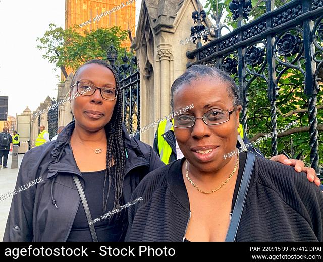 14 September 2022, Great Britain, London: Yvette (r, 59) and Helen Roberts (53) from Bedfordshire after their visit to the Queen's coffin at Westminster Hall