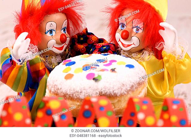 Faschingskrapfen mit Clown auf Party