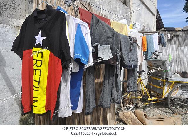 Dili (East Timor): a Fretilin (Frente Revolucionária do Timor Leste Independente, Revolutionary Front for an Independent East Timor) t-shirt drying with other...