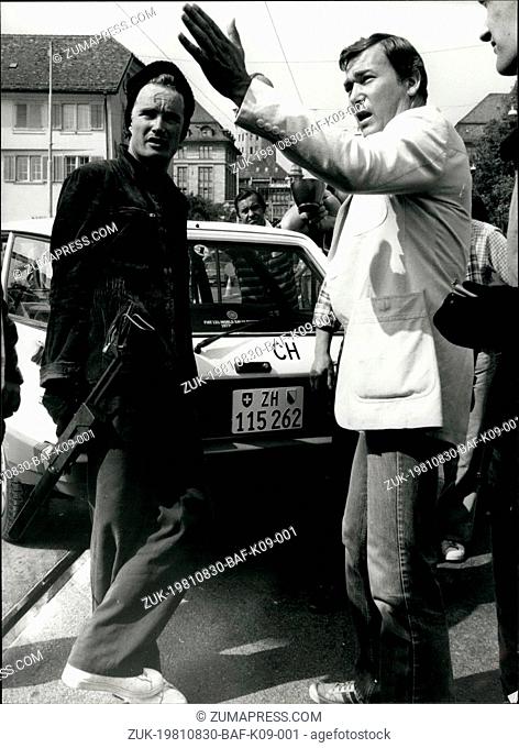 Aug. 30, 1981 - Explaining the action: French movie director Yves movie director Yves Boisset explains the action to unidentified actor during the shooting of...