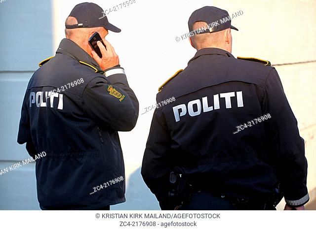 Back of two police officers