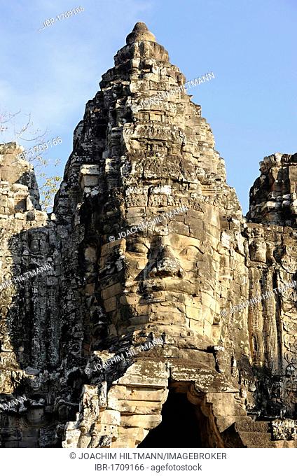 Carved stone face of Bodhisattva Lokeshvara over the south gate of Angkor Thom, Angkor, UNESCO World Heritage Site, Siem Reap, Cambodia, Southeast Asia, Asia