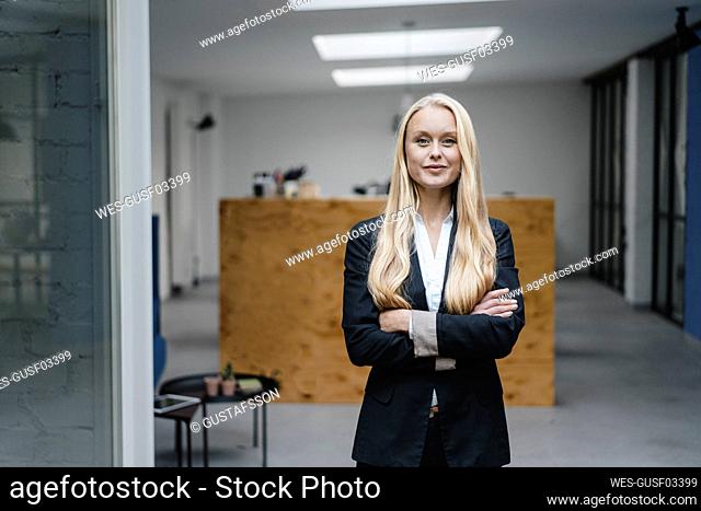 Portrait of a confident young businesswoman in loft office