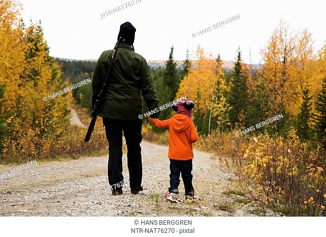 A woman and a child hunting, Sweden