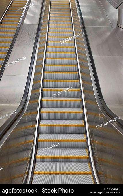 Empty escalator at a subway station