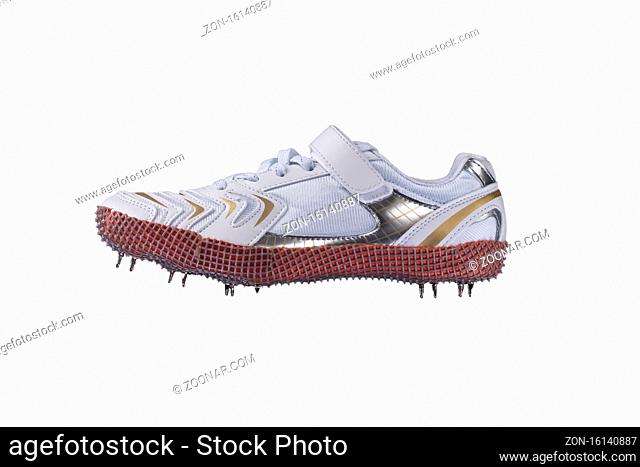 Sport shoes. White sneaker with spikes. Leather running shoes