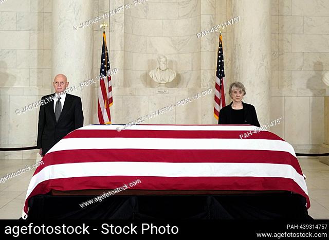 Former law clerks for former Associate Justice of the Supreme Court Sandra Day O'Connor stand at the casket during public repose in the Great Hall at the...