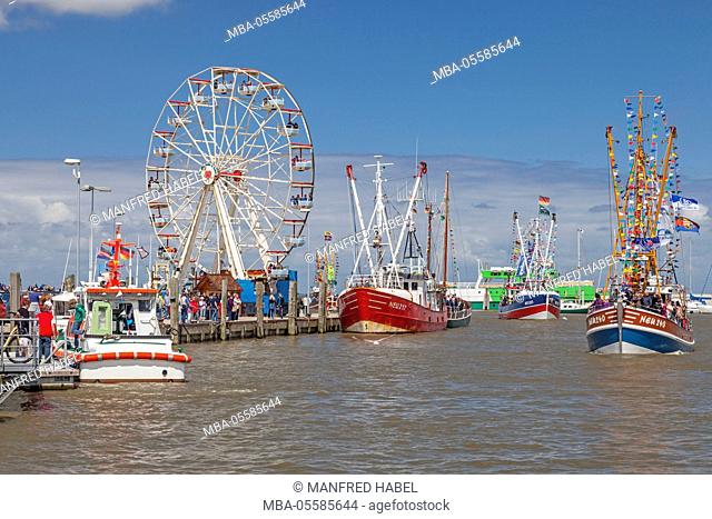 Cutter regatta, fishing cutter, harbour, big wheel in the background, Neuharlingersiel, Eastern Frisia