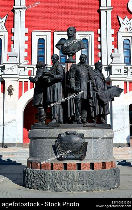 Moscow, Russia - March 14, 2016. Monument to a founders of Russian railroad on background of Kazansky station