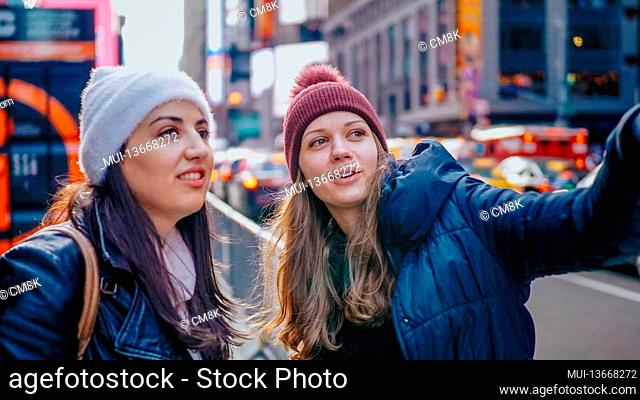 Two friends enjoy their vacation trip to New York - travel photography