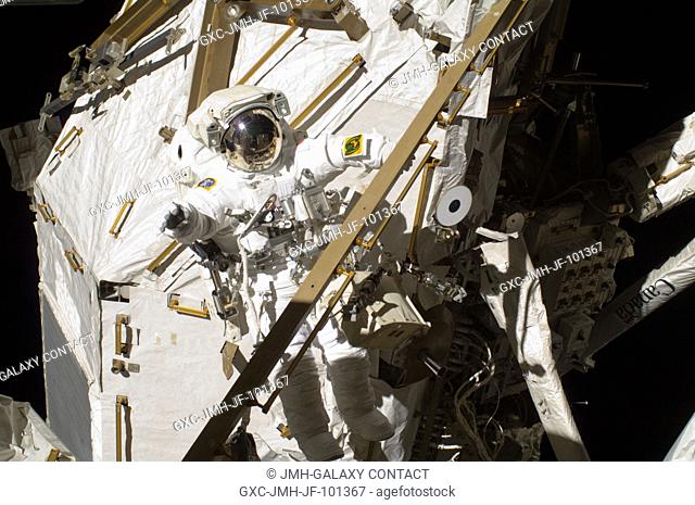 Japan Aerospace Exploration Agency astronaut Aki Hoshide, Expedition 32 flight engineer, participates in the mission's third session of extravehicular activity...