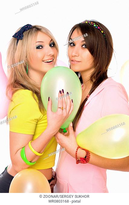 Sexy girls holding a balloon