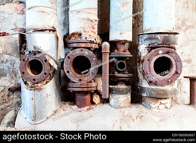 Pipes close-up in abandoned factory