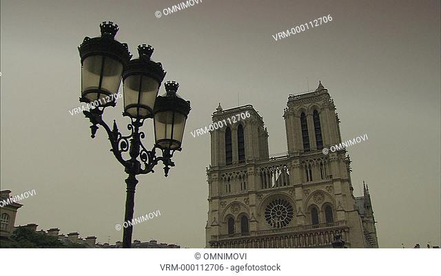 Notre Dame Cathedral with old streetlamps in foreground