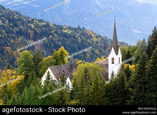 Austria, Vorarlberg, View of St Gerold abbey and Great Walser Valley