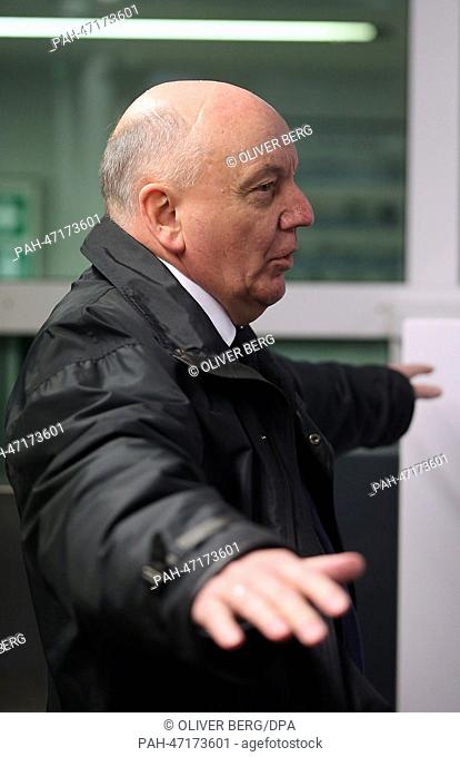 Husband of the Quelle inheritrix Madeleine Schickedanz, Leo Herl, appears at the District Court in Cologne, Germany, 17 March 2014