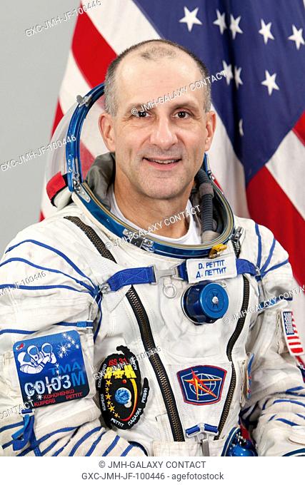 NASA astronaut Don Pettit, Expedition 3031 flight engineer, attired in a Russian Sokol launch and entry suit, takes a break from training in Star City