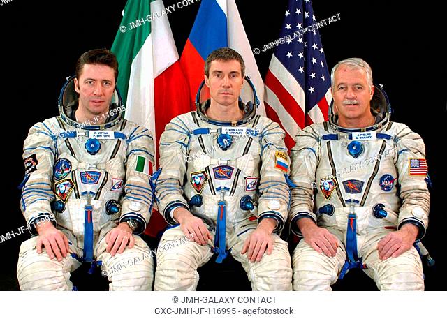 Soyuz TMA-6 crew pauses from busy training schedule for a crew portrait. From the left are Roberto Vittori, flight engineer