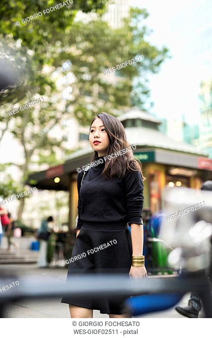 USA, New York City, Manhattan, portrait of young woman dressed in black
