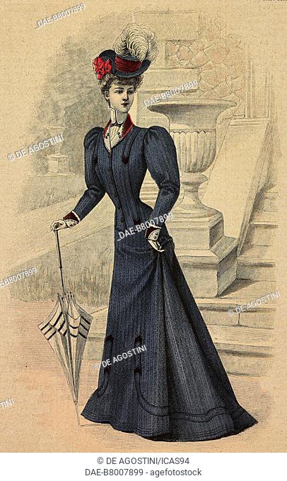Woman wearing a woolen Cheviot suit, jacket with velvet inserts, puffed sleeves, coordinated hat and umbrella, creation by High Life Tailor