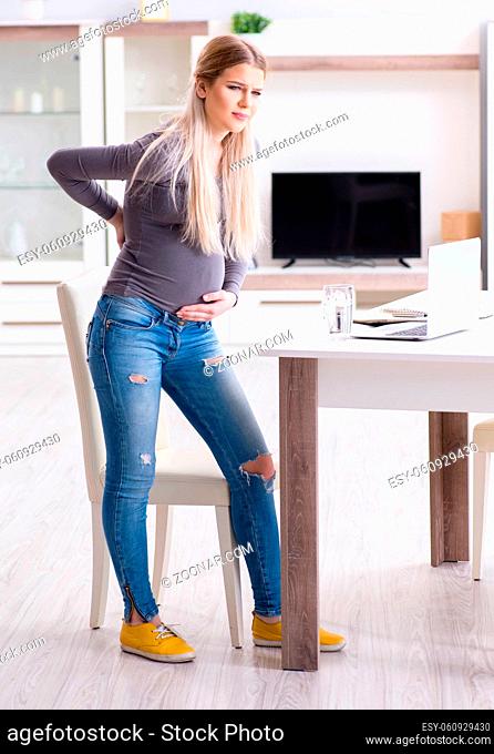 The pregnant woman at home getting ready for childbirth