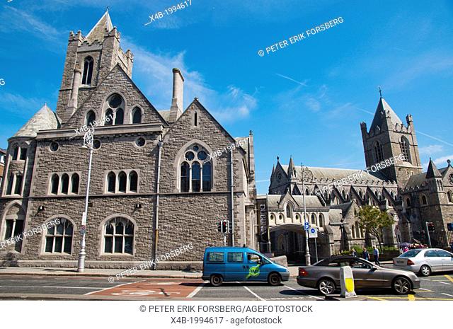 Traffic on High Street in front of Dublinia living history museum in Synod Hall of Christ Church Cathedral Dublin Ireland Europe
