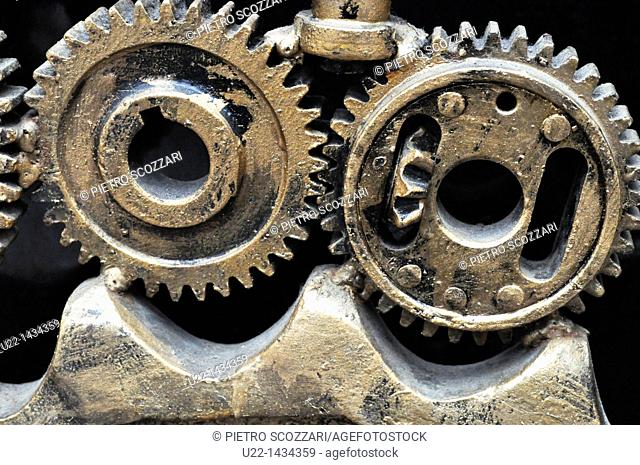 Yangshou (China): detail of a sculpture made with gears outside a bar along the Walking Street