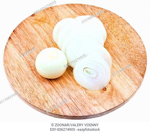 bulb and sliced onions on wooden cutting board