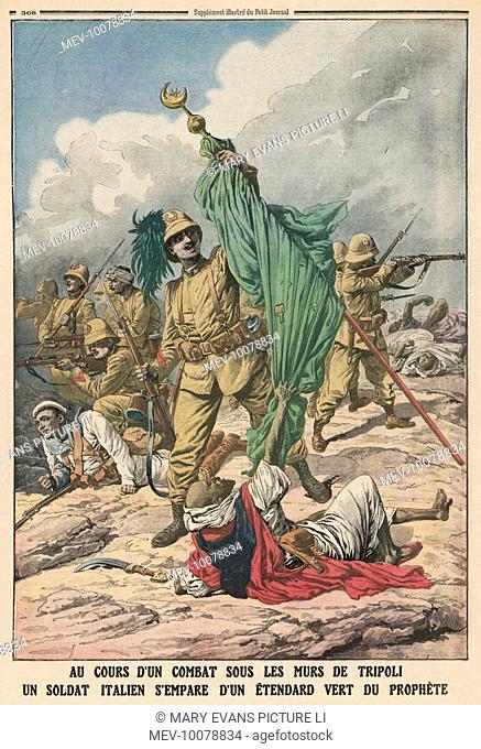 An Italian soldier seizes the the green flag of the Prophet signifying their battle victory, during the Tripolitanian War (1911 - 1912)