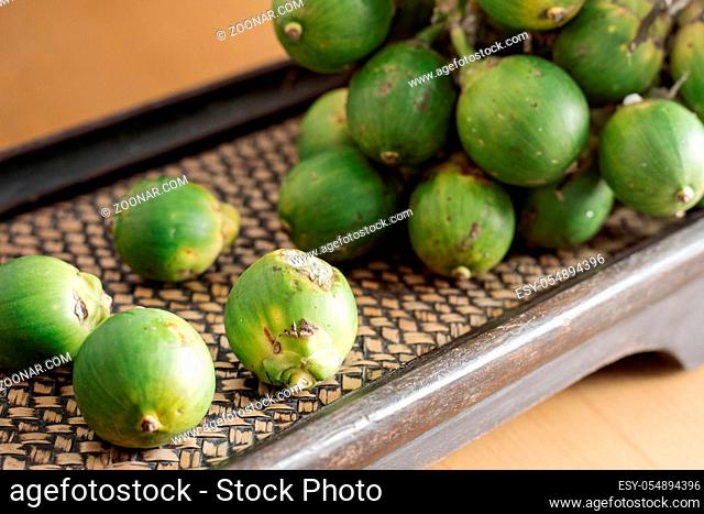betel nut on the old wooden tray