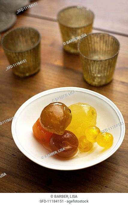 Mostarda di frutta (Italian condiment made of candied fruit and a mustard flavoured syrup) in a bowl