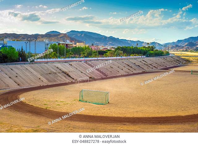 A football field on the mountains on the background A quiet and beautiful place for a football game in Andalusia, Spain